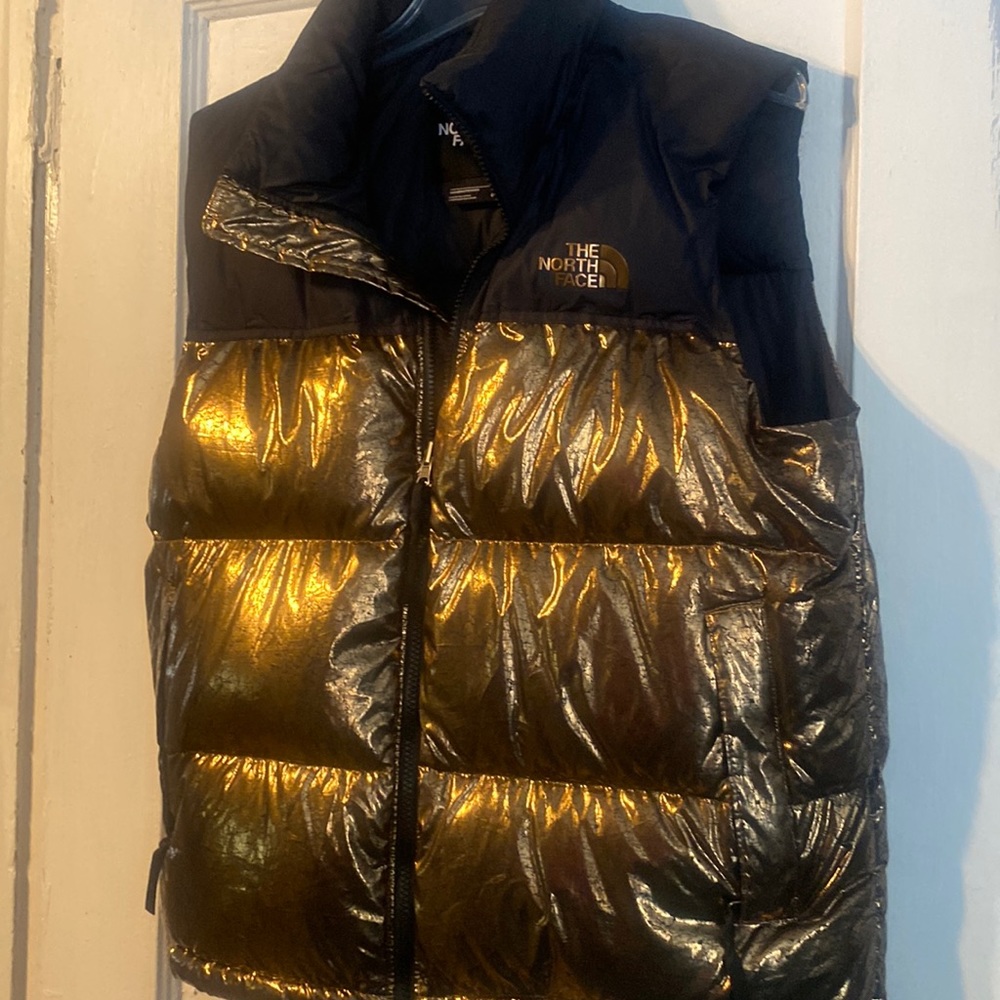 North face gold and black puffer vest